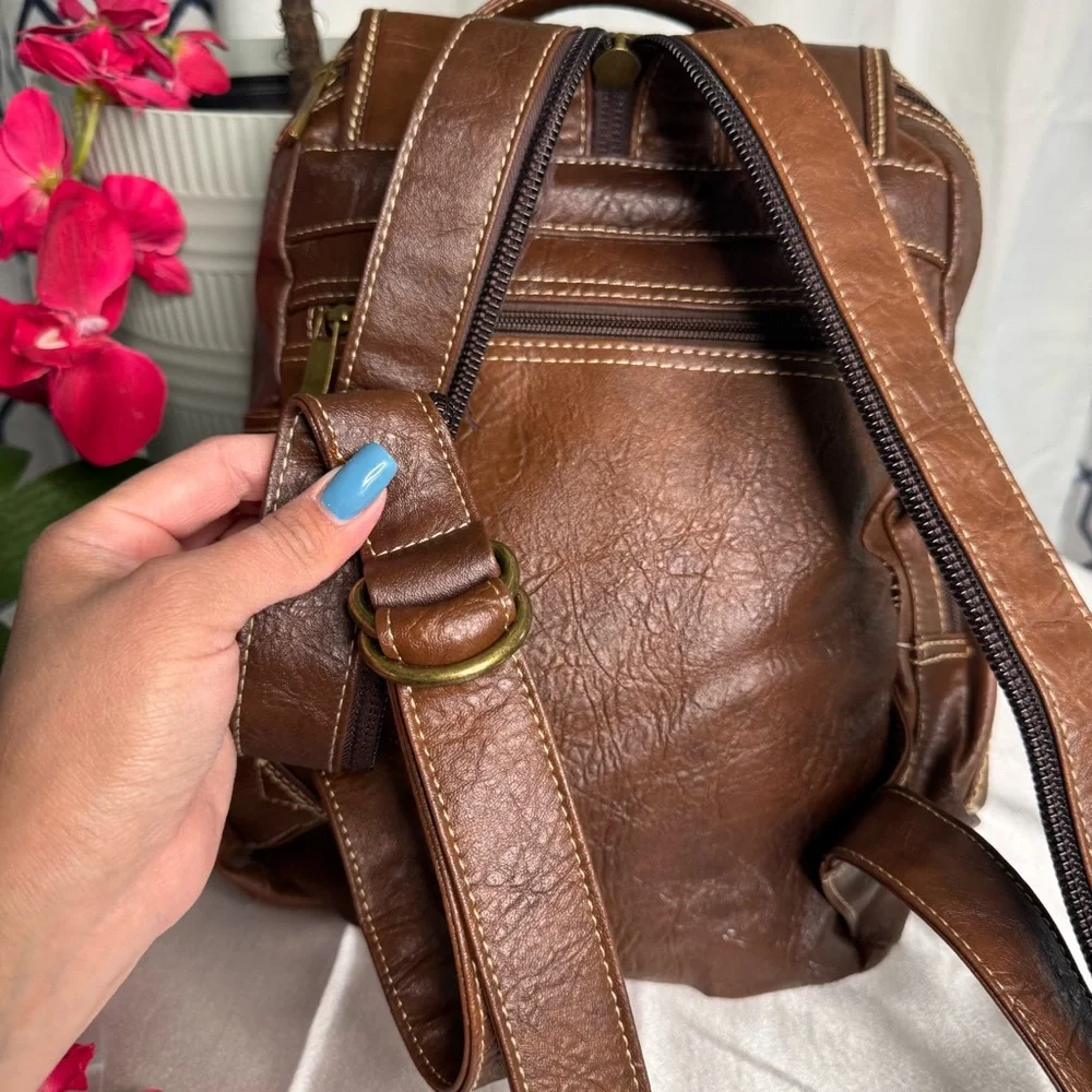 Brown Leather Backpack with Gold Accents